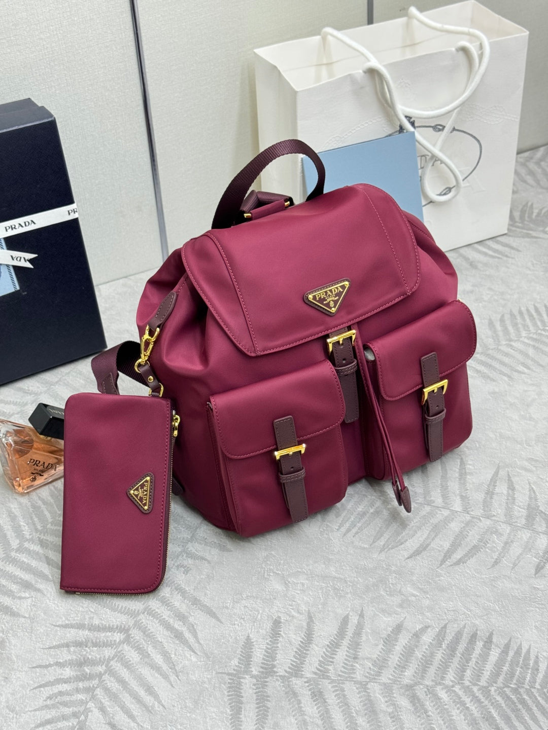 PRADA 25S RE-EDITION 1978 SMALL BACKPACK 32 IN BURGUNDY RE-NYLON