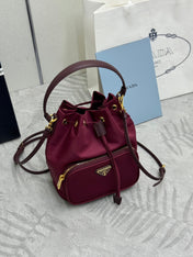 PRADA 25S DUET BUCKET BAG 23 IN BURGUNDY RE-NYLON GOLD HARDWARE