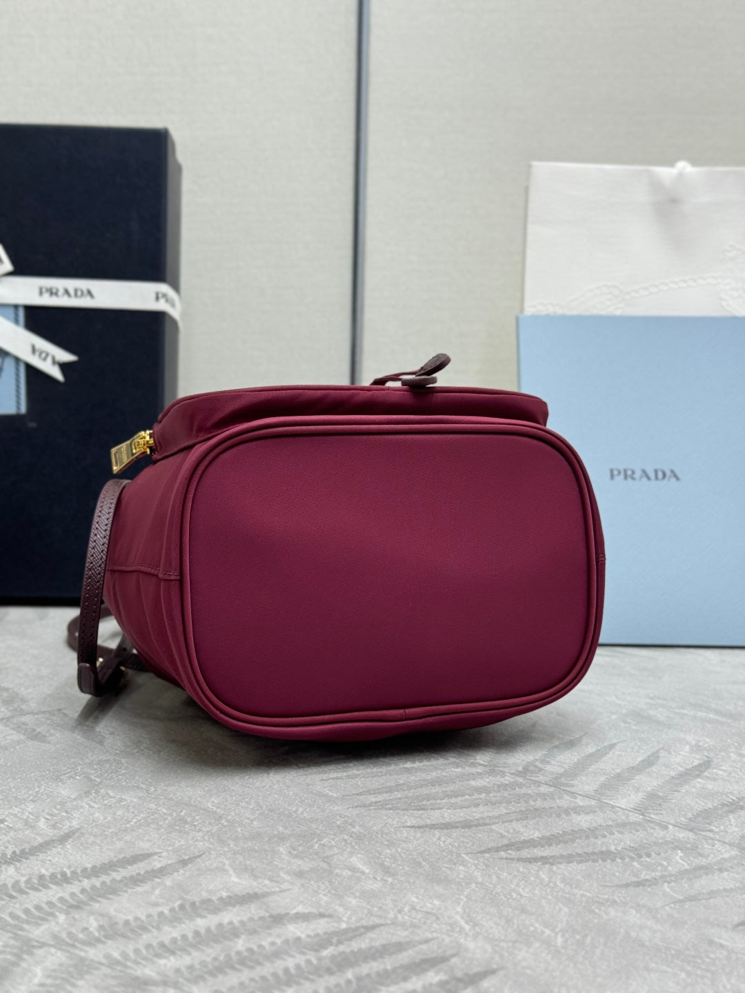 PRADA 25S DUET BUCKET BAG 23 IN BURGUNDY RE-NYLON GOLD HARDWARE
