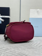 PRADA 25S DUET BUCKET BAG 23 IN BURGUNDY RE-NYLON GOLD HARDWARE
