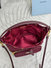 PRADA 25S DUET BUCKET BAG 23 IN BURGUNDY RE-NYLON GOLD HARDWRE