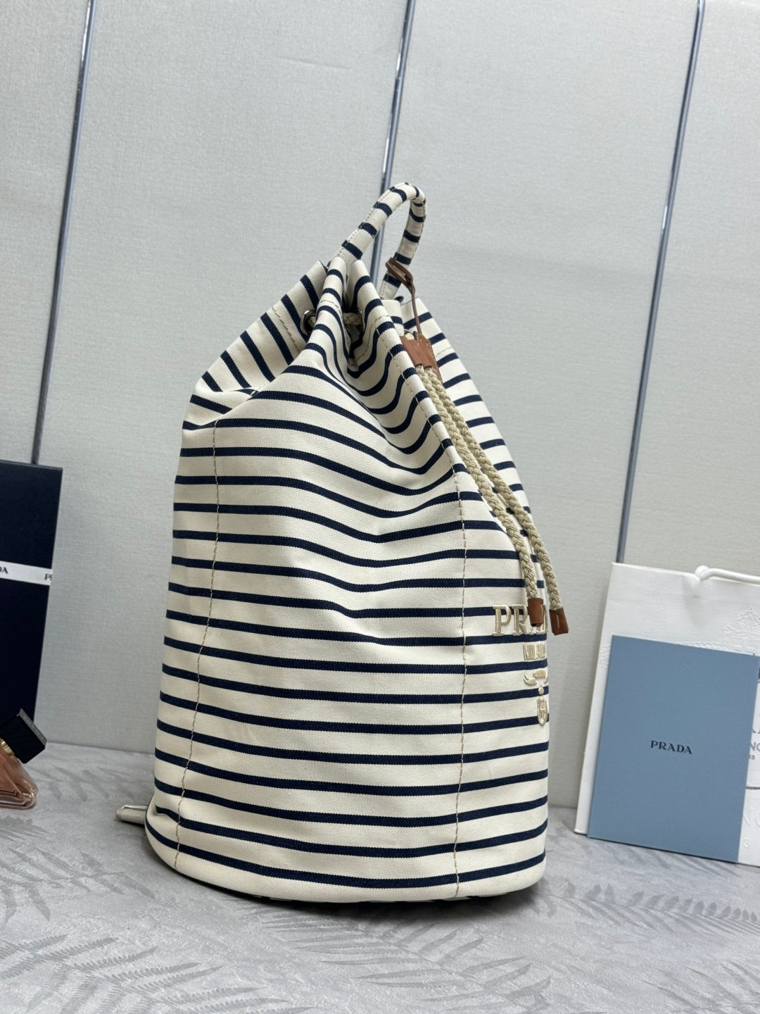 PRADA 25S DRAWSTRING BACKPACK 55 IN HORIZONTAL STRIPES CANVAS SILVER HARDWRE
