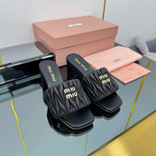 MATELASSÉ SLIDES PUMP IN BLACK CALFSKIN