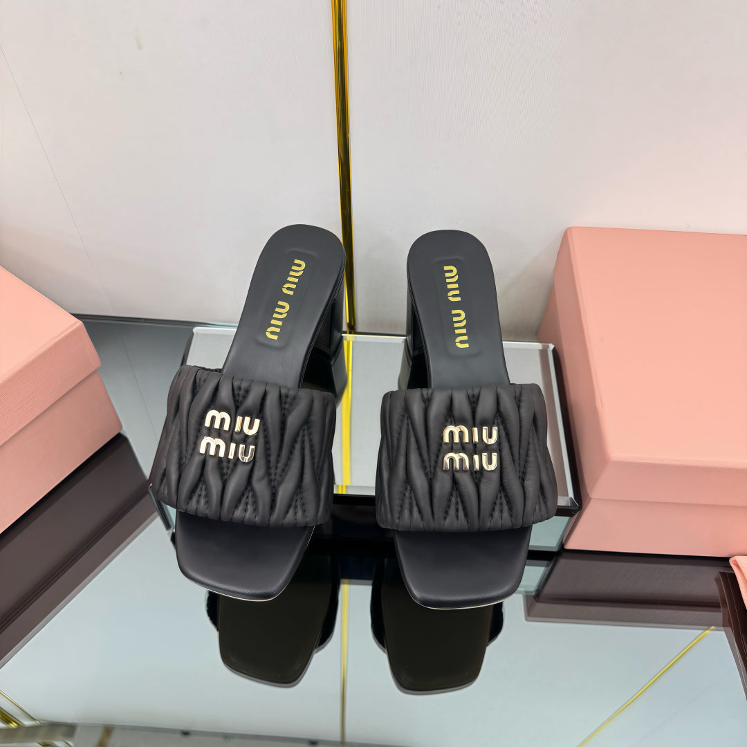 MATELASSÉ SLIDES PUMP IN BLACK CALFSKIN