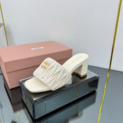 MATELASSÉ SLIDES PUMP IN OFF WHITE CALFSKIN