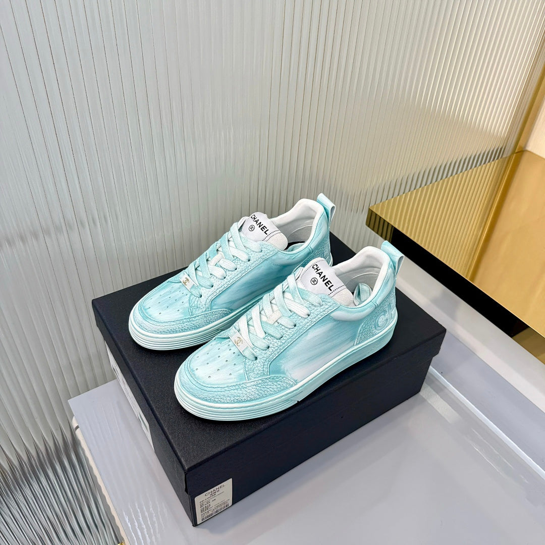 CHANEL 26S LOW-TOP SNEAKERS IN LIGHT MINT BLUE CALFSKIN