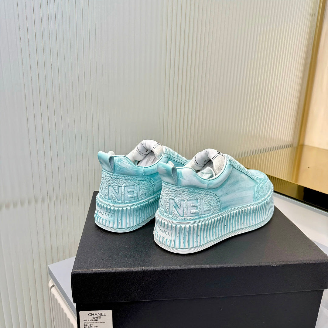 CHANEL 26S LOW-TOP SNEAKERS IN LIGHT MINT BLUE GRAFFITI PATTERN CALFSKIN