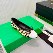 CHANEL 26S FLAT SHOES IN LIGHT YELLOW AND BLACK LEOPARD PRINT PONY HAIR
