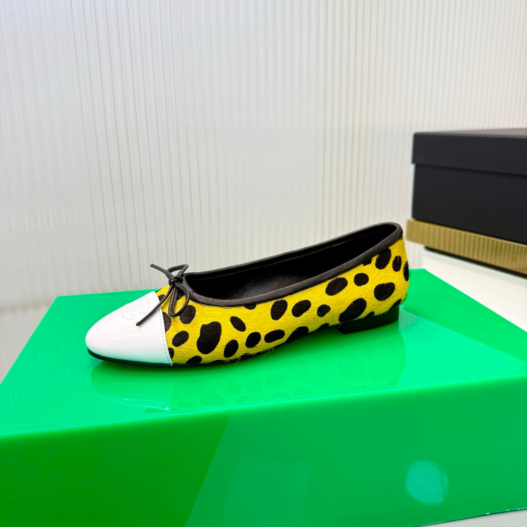 CHANEL 26S FLAT SHOES IN YELLOW AND BLACK LEOPARD PRINT PONY HAIR
