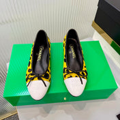 CHANEL 26S FLAT SHOES IN YELLOW AND BLACK LEOPARD PRINT PONY HAIR