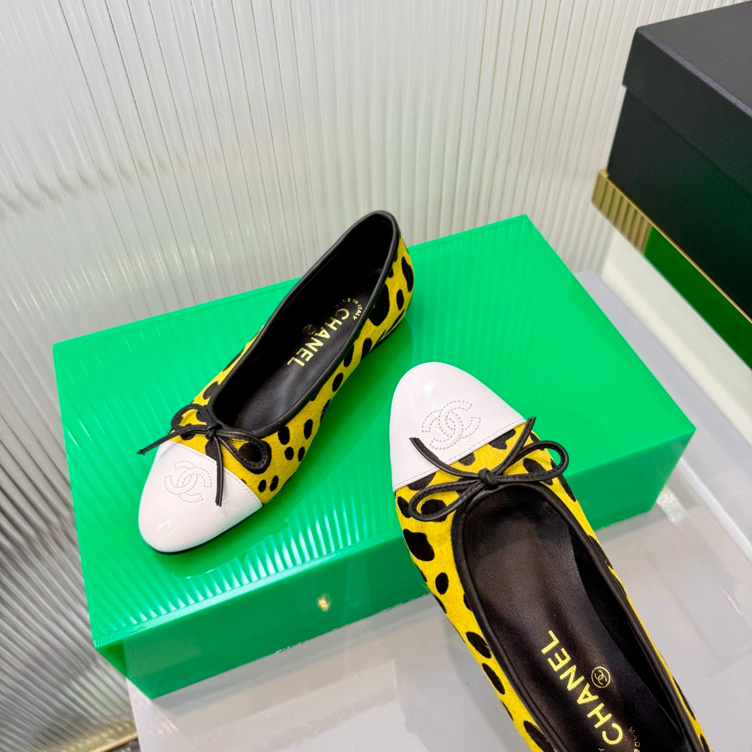 CHANEL 26S FLAT SHOES IN YELLOW AND BLACK LEOPARD PRINT PONY HAIR