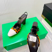CHANEL 26S HIGH-HEEL SLINGBACKS 70 MM IN WHITE PATENT CALFSKIN WITH ORANGE PONY HAIR