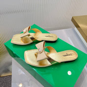CHANEL 26S THONG SANDALS IN GOLD LAMBSKIN AND FABRIC WITH BOW
