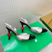 CHANEL 26S SLINGBACK POINTED-TOE HEELS 95 MM IN SILVER LAMBSKIN WITH BLACK CAP TOE