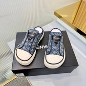 CHANEL 26S MULE SNEAKERS IN NAVY BLUE DIAMOND-PATTERNED WOVEN DENIM FABRIC