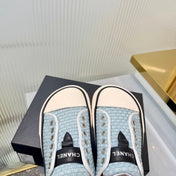 CHANEL 26S MULE SNEAKERS IN LIGHT BLUE WOVEN FABRIC