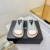 CHANEL 26S MULE SNEAKERS IN LIGHT BLUE WOVEN FABRIC