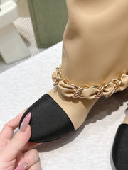 CHANEL 25S CALF-LENGTH BOOTS 45MM IN BEIGE AND BLACK CALFSKIN GOLD HARDWARE