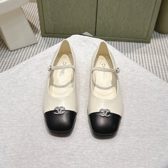 CHANEL 25S MARY JANE FLATS IN IVORY LAMBSKIN WITH BLACK CAP TOE SILVER HARDWARE