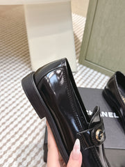 CHANEL 25S GODDESS FLAT LOAFERS IN BLACK PATENT CALFSKIN GOLD HARDWARE