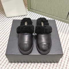 CHANEL 25S INDOOR SLIPPERS IN BLACK CALFSKIN FUR-LINED