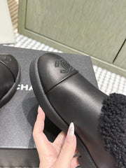 CHANEL 25S SHORT BOOTS IN BLACK CALFSKIN WITH SHEEPSKIN LINING