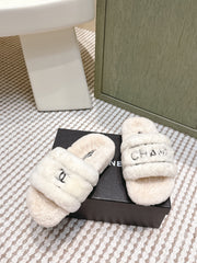 CHANEL 25S FLUFFY SLIDERS IN BEIGE AND WHITE