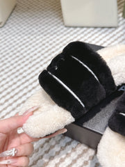 CHANEL 25S FLUFFY SLIDERS IN BEIGE AND BLACK