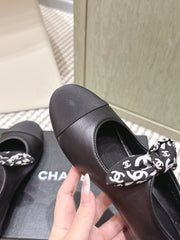 CHANEL 25S MARY JANES IN BLACK SHEARLING AND GROS GRAIN