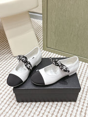 CHANEL 25S MARY JANES IN WHITE AND BLACK SHEARLING AND GROS GRAIN
