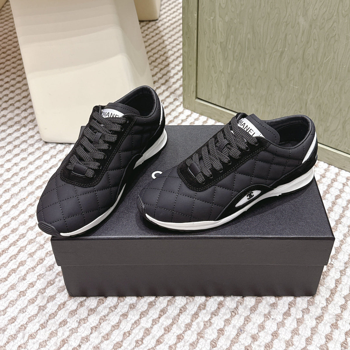CHANEL 25S SNEAKERS IN BLACK CALFSKIN AND SUEDE
