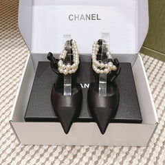 CHANEL 25S ESPADRILLE FLATS IN BLACK CALFSKIN WITH PEARL STRAP