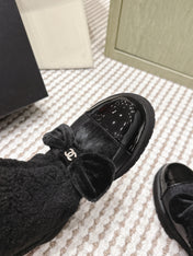 CHANEL 25S ANKLE BOOTS IN BLACK SHEARLING LAMBSKIN AND PATENT CALFSKIN