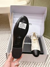 CHANEL 25S BALLERINA SHOES IN WHITE AND BLACK CALFSKIN GOLD HARDWARE