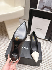 CHANEL 26S HIGH HEELS IN BLACK LAMBSKIN WITH WHITE CHEVRON-QUILTED TOE