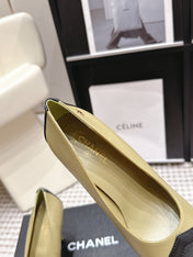 CHANEL 26S HIGH HEELS IN CREAM BEIGE LAMBSKIN WITH BLACK CHEVRON-QUILTED TOE