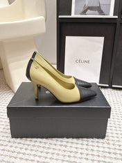 CHANEL 26S HIGH HEELS IN CREAM BEIGE LAMBSKIN WITH BLACK CHEVRON-QUILTED TOE