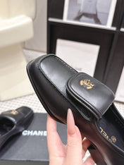 CHANEL 26S LOAFERS IN BLACK CALFSKIN WITH GOLD-TONE CC LOGO