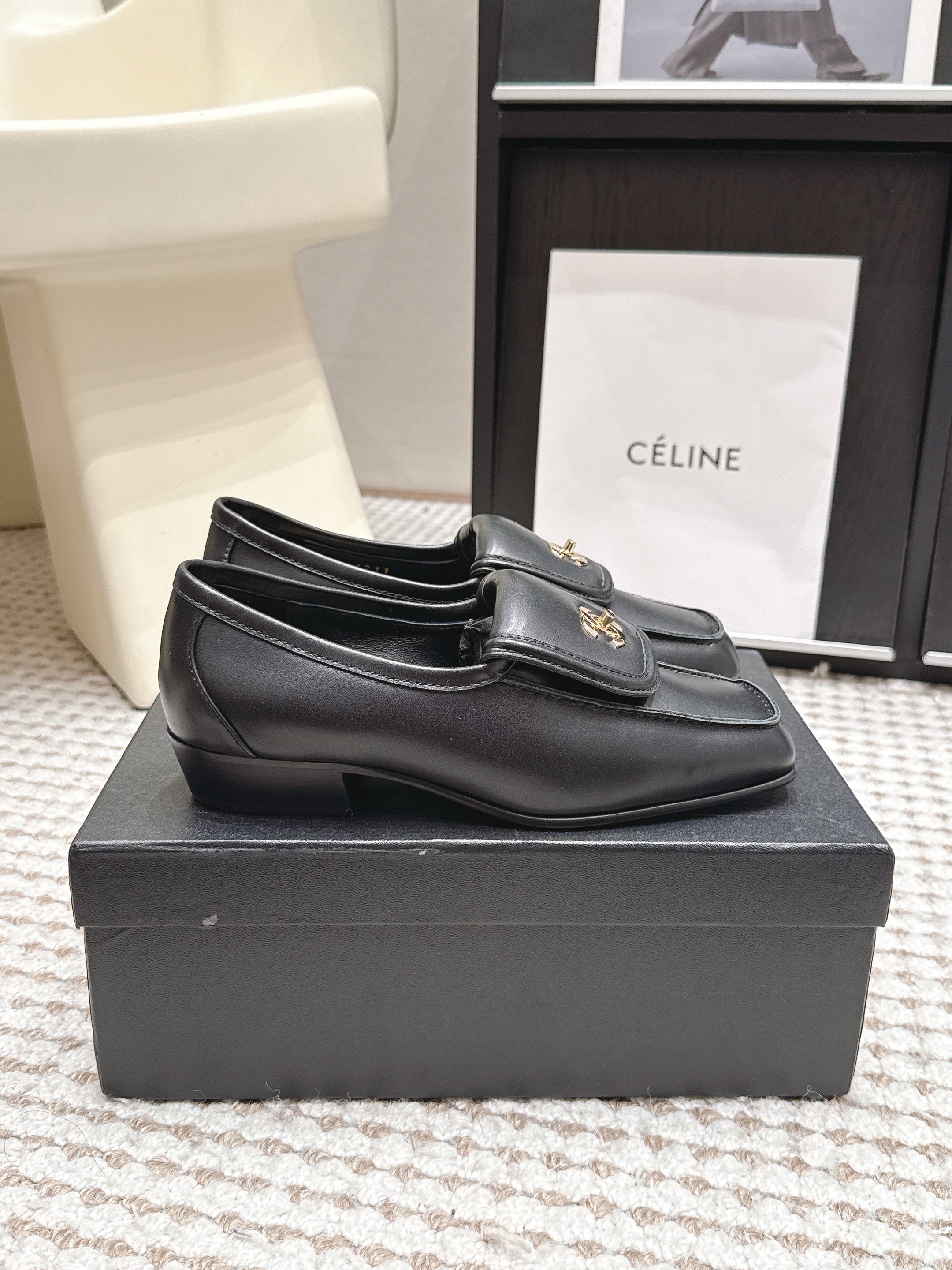 CHANEL 26S LOAFERS IN BLACK CALFSKIN WITH GOLD-TONE CC LOGO