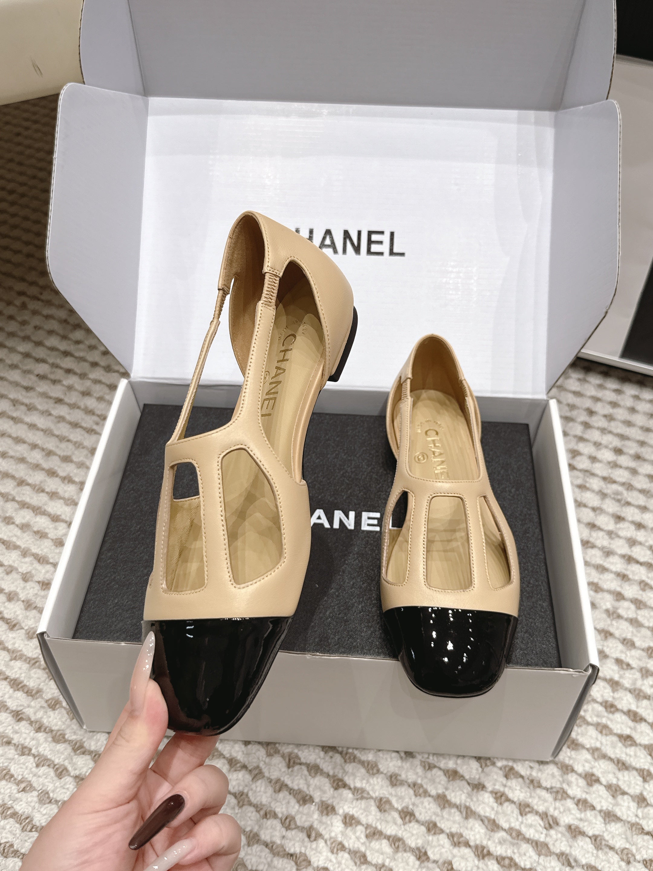 CHANEL 26S ROUND TOE MARY JANE FLATS IN OFF BEIGE CUTOUT CALFSKIN WITH BLACK PATENT TOE