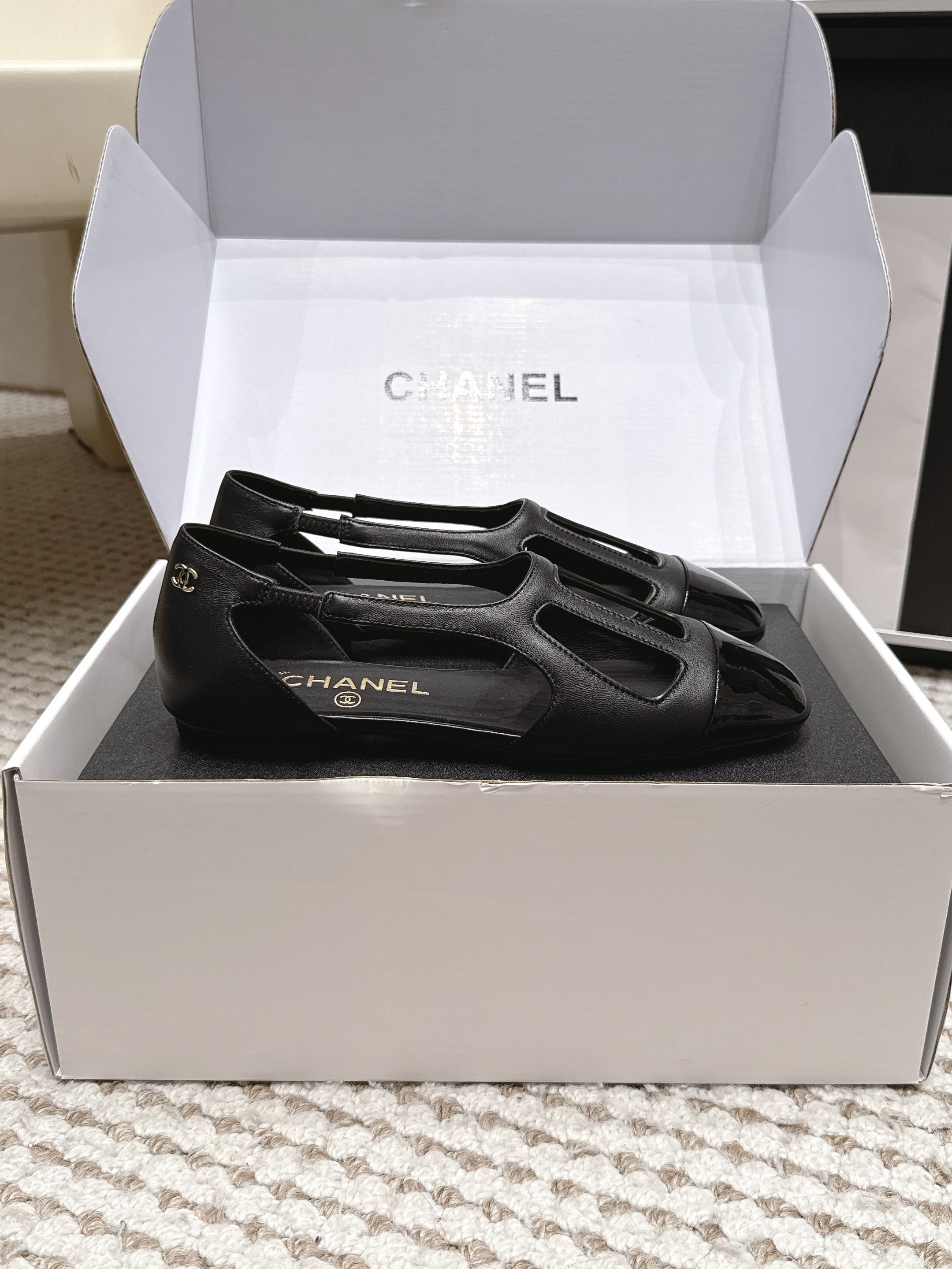 CHANEL 26S ROUND TOE MARY JANE FLATS IN BLACK CUTOUT CALFSKIN
