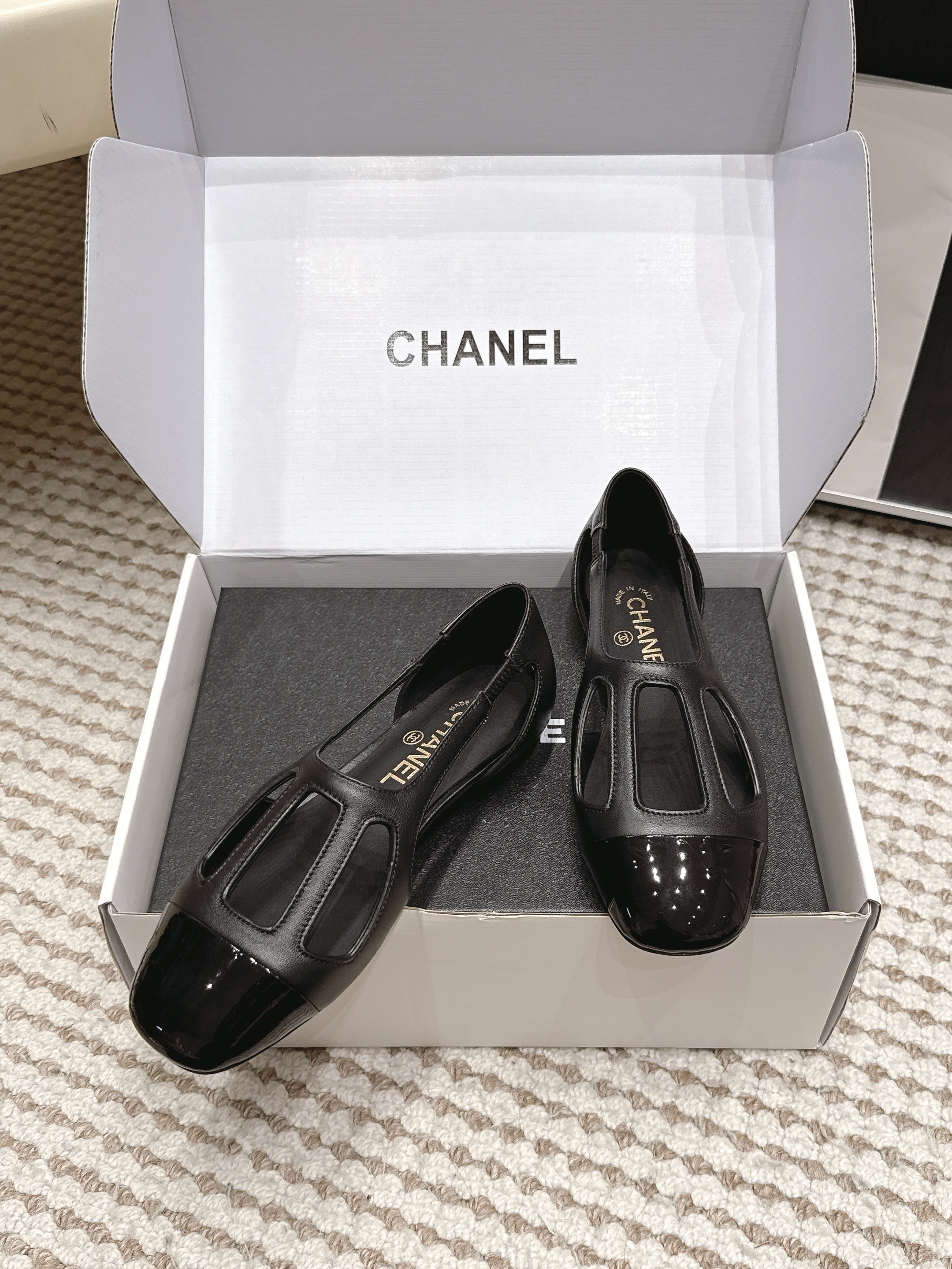 CHANEL 26S ROUND TOE MARY JANE FLATS IN BLACK CUTOUT CALFSKIN
