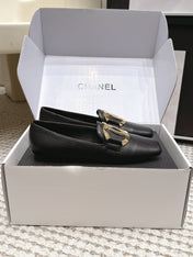 CHANEL 26S SQUARE TOE FLATS IN BLACK CALFSKIN WITH GOLD TONE CC LOGO