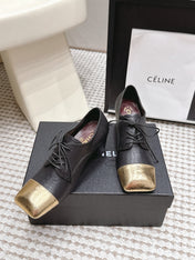 CHANEL 26S LACE-UP OXFORD HEELS IN BLACK CALFSKIN WITH GOLD TOE CAP