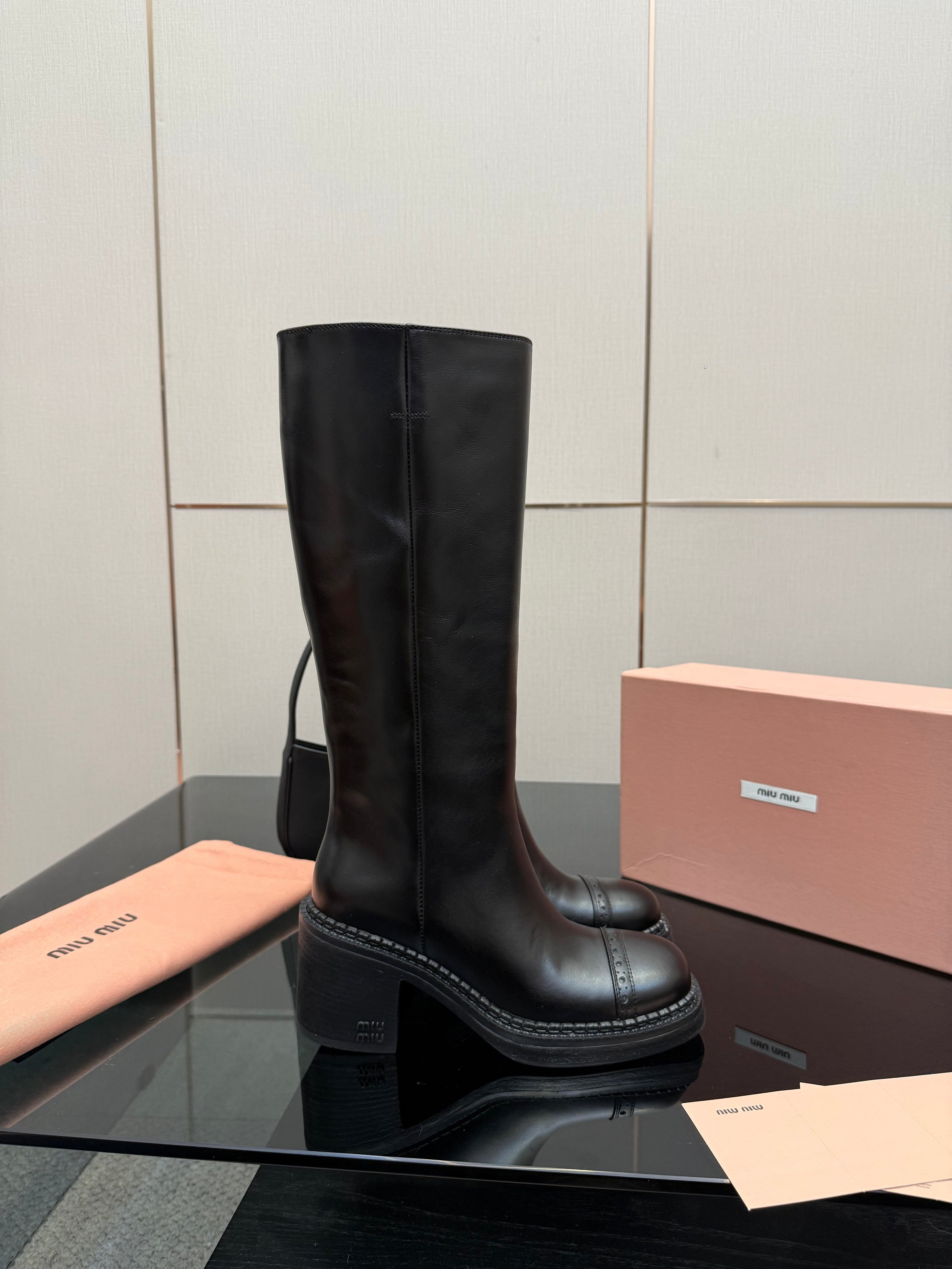 MIUMIU 25S KNEE-HIGH BOOTS IN BLACK CALFSKIN