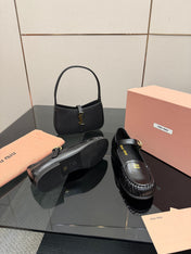 MIUMIU 25S LOAFERS WITH STRAP IN BLACK LAMBSKIN