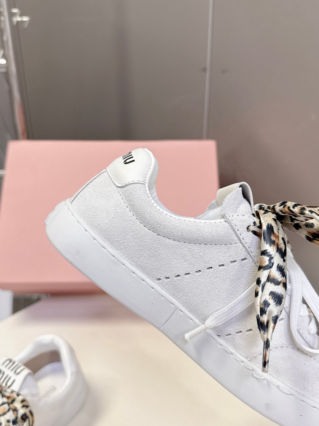 MIUMIU 25S SNEAKERS IN WHITE SUEDE WITH LEOPARD-PRINT LACES