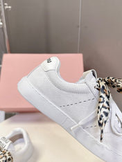 MIUMIU 25S SNEAKERS IN WHITE SUEDE WITH LEOPARD-PRINT LACES