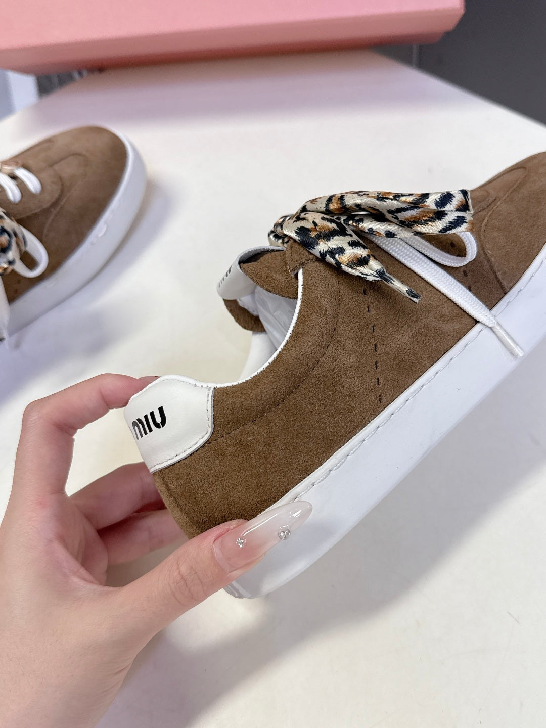 MIUMIU 25S SNEAKERS IN EARTH BROWN SUEDE WITH LEOPARD-PRINT LACES