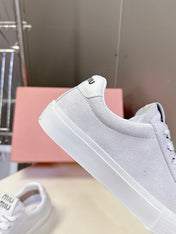 MIUMIU 25S SNEAKERS IN WHITE SUEDE